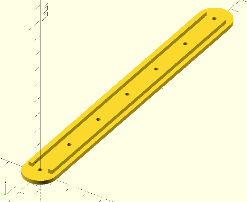 A yellow flat bar with 7 holes along its length