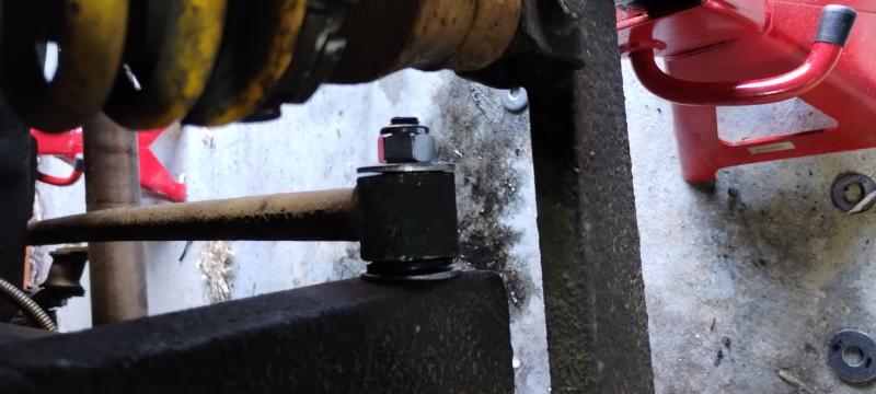 Panhard rod fitted, the end of the bolt can be seen poking out of the nut