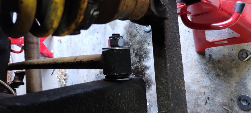 Panhard rod fitted, the end of the bolt can be seen poking out of the nut
